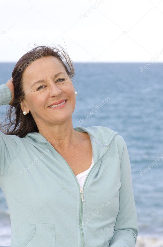 Portrait Pretty mature woman at seaside