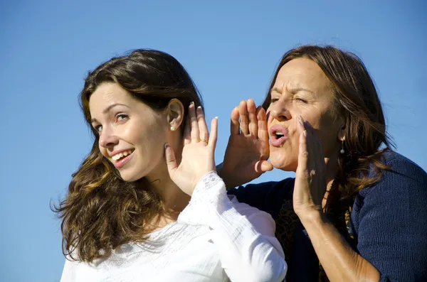 Two generations, friends, shouting and listening maby deaf — Stock Photo, Image