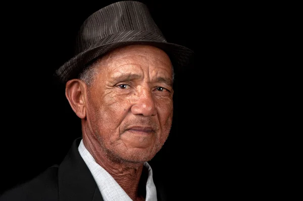 Poważny człowiek stary kapelusz — Zdjęcie stockowe