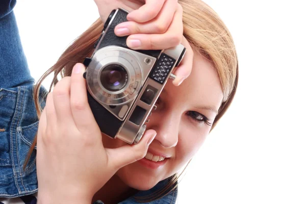 Hübsche junge Frau mit Vintage-Kamera lizenzfreie Stockbilder