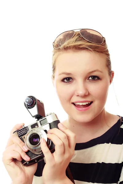 漂亮的年轻女人与复古相机包 免版税图库照片