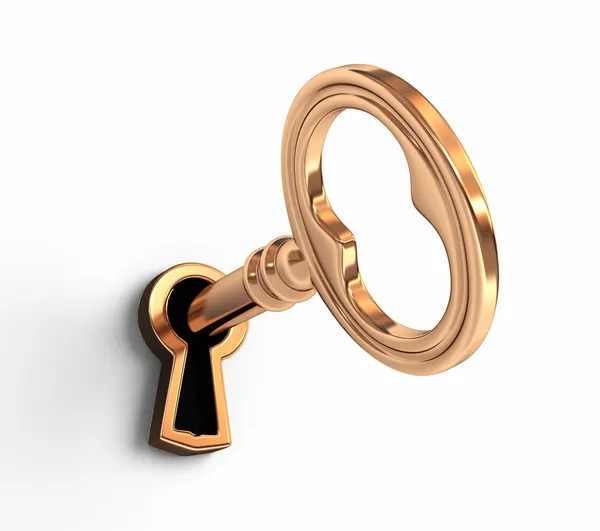 Goldener Schlüssel im Schlüsselloch Stockbild