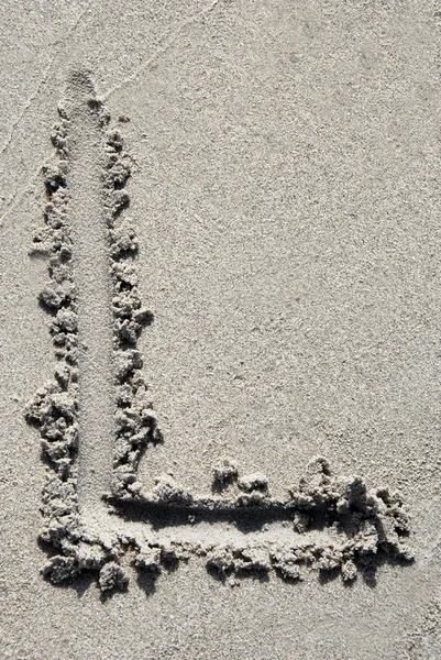 Sand beach alphabet: letter L — Stock Photo, Image