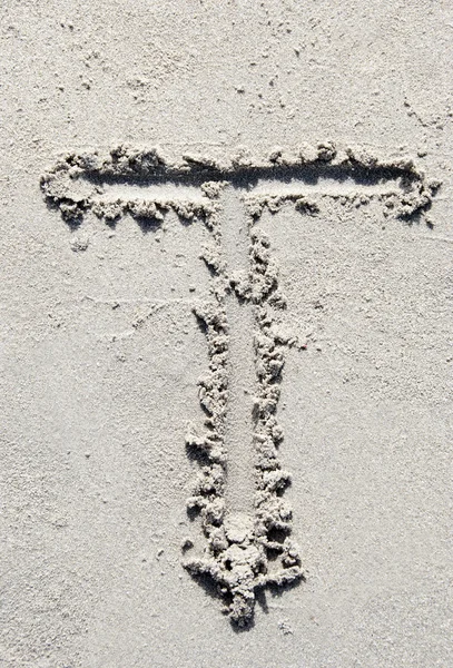 Písečná pláž abeceda: písmeno T — Stock fotografie