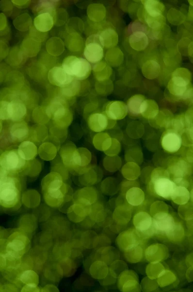 Зеленый фон текстуры боке — стоковое фото