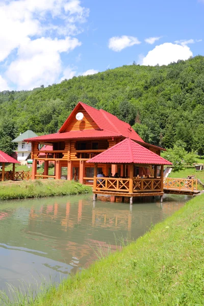 stock image Wooden houses in the mountains.