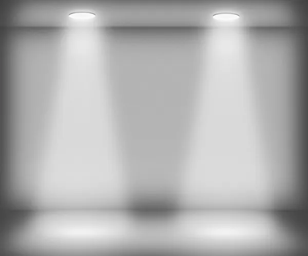 Белая комната с двумя прожекторами — стоковое фото