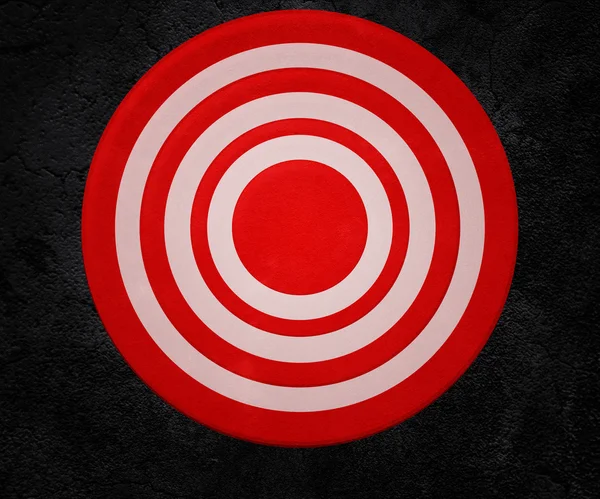 Rote Zielscheibe auf dem Hintergrund der Wand — Stockfoto