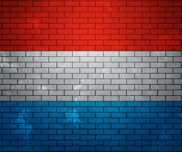 Flagge Luxemburgs an Ziegelmauer — Stockfoto