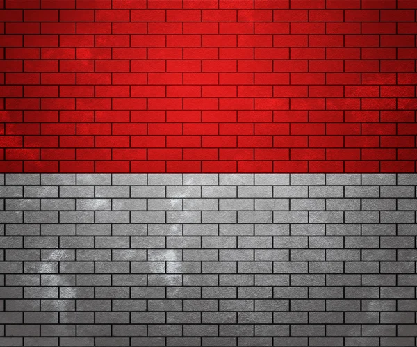 Σημαία του Μονακό στο τοίχο από τούβλα — Φωτογραφία Αρχείου