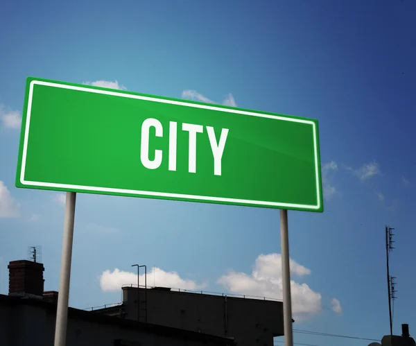City on Green Road Sign — Stock Photo, Image