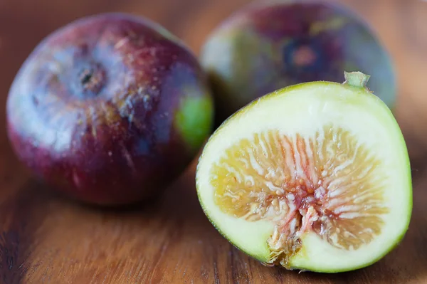 stock image Figs on wooden plate