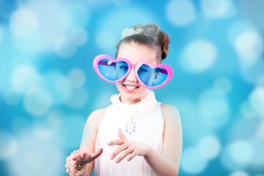 A girl in big glasses clipart