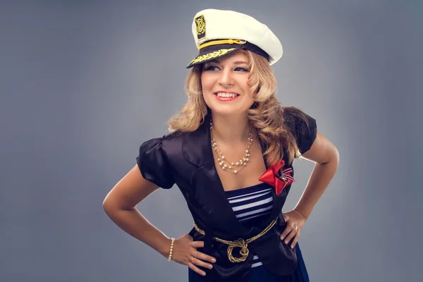 stock image A beautiful woman dressed in a nautical style