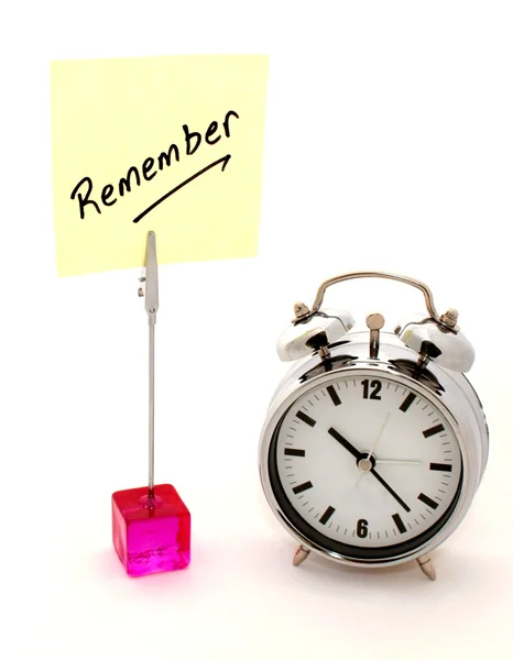 stock image Remember, yellow note and alarm clock