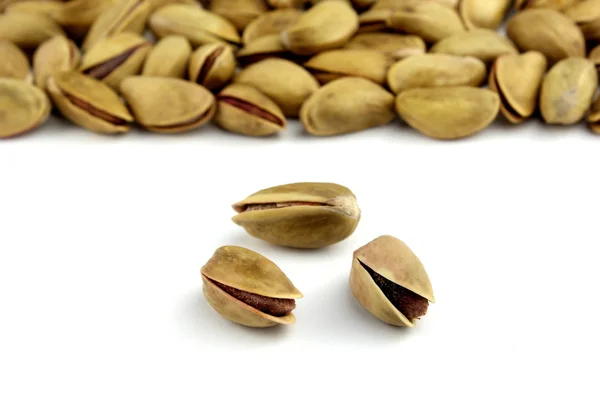 Pistachio nuts on white background — Stock Photo, Image