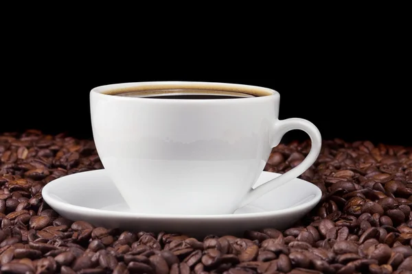 Fincan kahve ve fasulye dolu — Stok fotoğraf