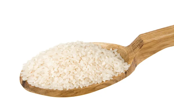 Raw rice seed in wooden spoon isolated on white — Stock Photo, Image