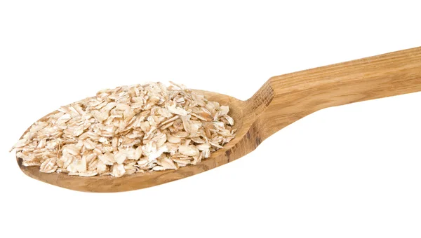 Oatmeal cereals in spoon isolated on whit — Stock Photo, Image
