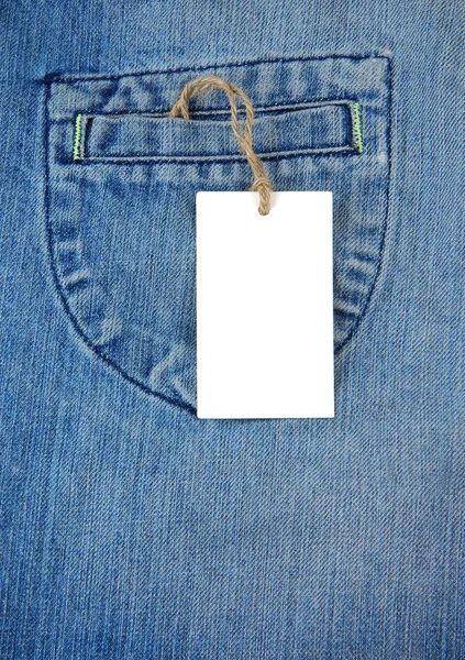 Calça jeans velha e etiqueta de preço — Fotografia de Stock