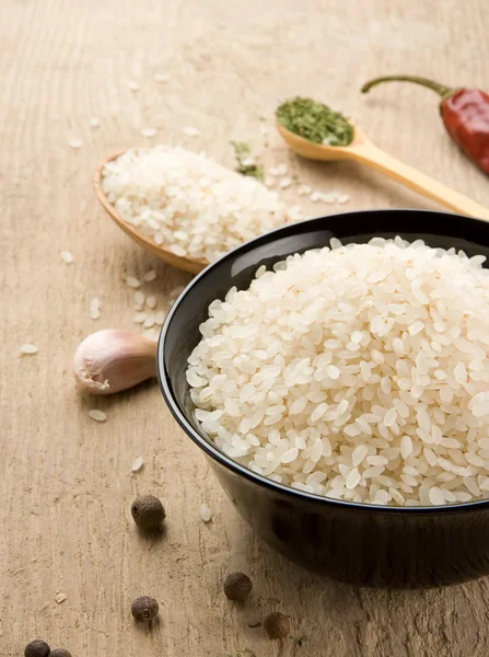 Set of nutrition and rice on wood — Stock Photo, Image