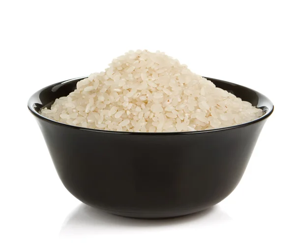 Reis im Teller isoliert auf weiß — Stockfoto