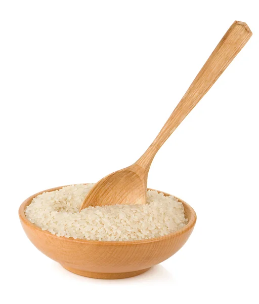 Ahşap tabak pirinç ve izole üzerinde beyaz kaşık — Stok fotoğraf