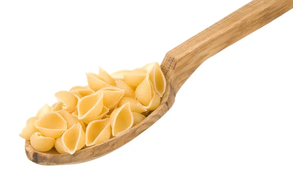 Ruwe pasta en lepel geïsoleerd op wit — Stockfoto