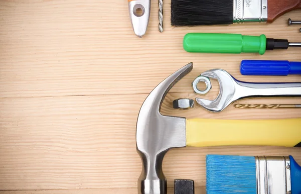 Set of tools on wood board — Stock Photo, Image