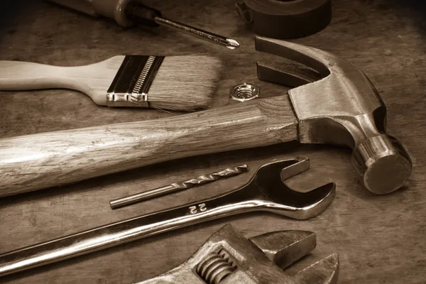 Tools and instruments on wood board — Stock Photo, Image