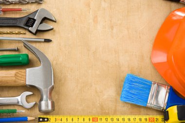 Construction tools on wood clipart