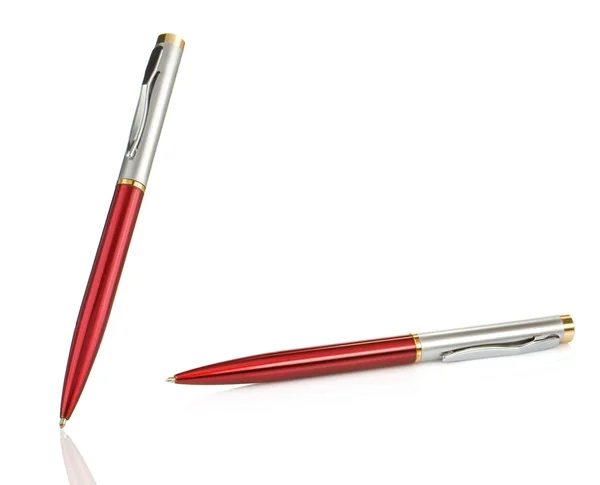 Röd och silver glänsande pennor på vit — Stockfoto