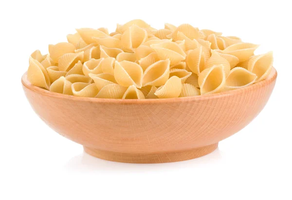 Raw pasta and plate isolated on white — Stock Photo, Image