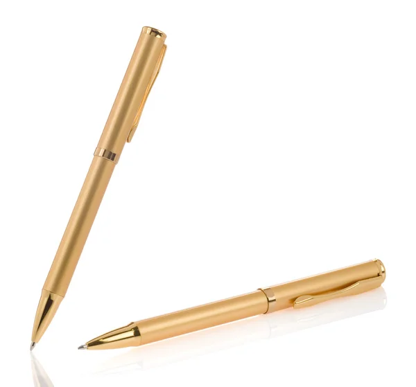 Bolígrafos dorados aislados en blanco —  Fotos de Stock