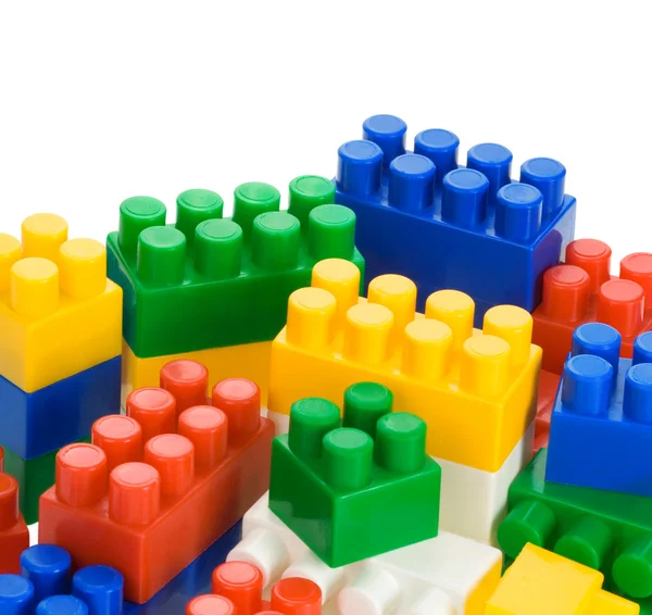 Brinquedos de plástico coloridos em branco — Fotografia de Stock