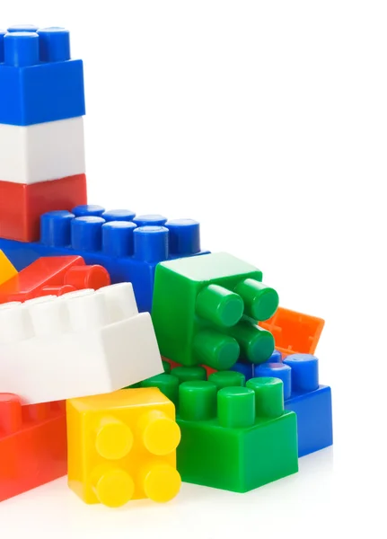 Brinquedos plásticos coloridos isolados em branco — Fotografia de Stock