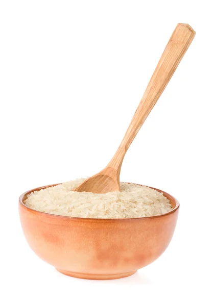 Рис в тарелке и ложке — стоковое фото