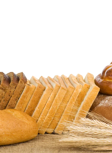 Set van bakkerijproducten op wit — Stockfoto