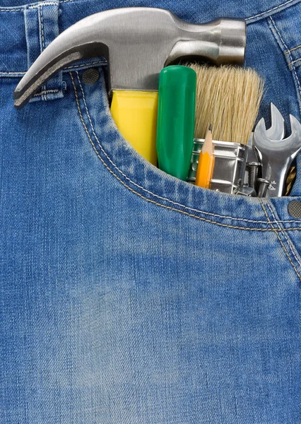 Ferramentas e instrumentos em jeans — Fotografia de Stock
