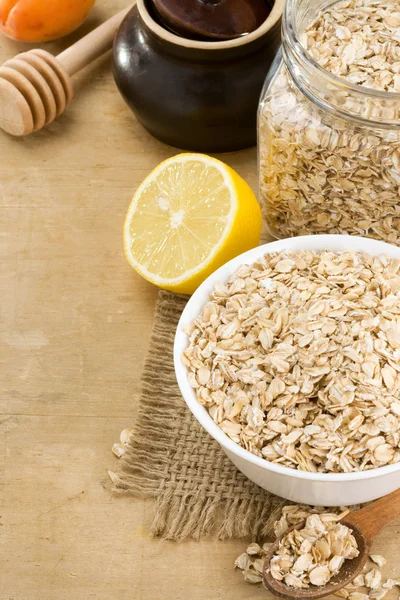 Cereals oat flake and healthy food — Stock Photo, Image