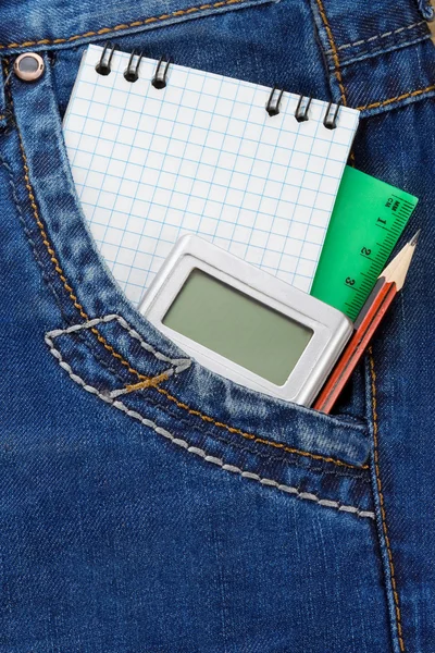 Cuaderno y lápiz en jeans — Foto de Stock