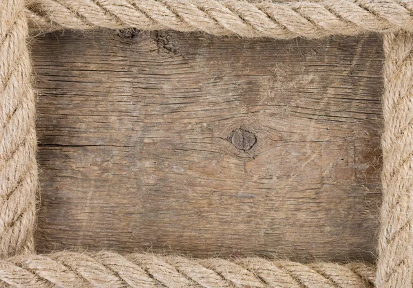 Fartyget rep och gammal trä bakgrund — Stockfoto
