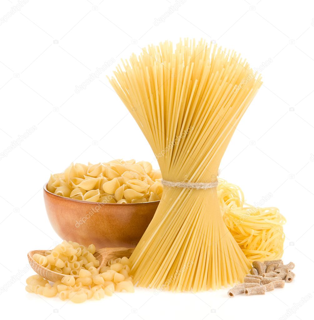 Pasta and wooden plate on white