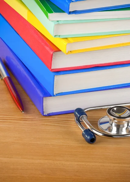 Medical stethoscope with book — Stock Photo, Image