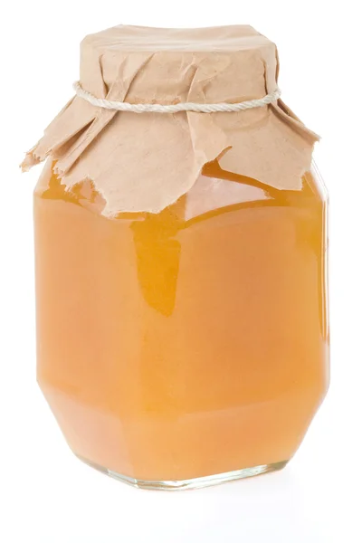 蜂蜜の瓶を白で隔離されます。 — ストック写真