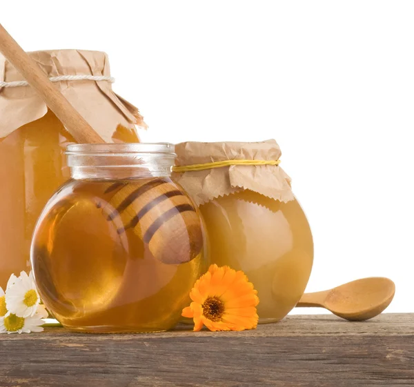 Honey in jar isolated on white — Stock Photo, Image