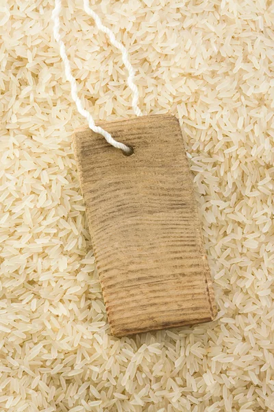 Рисове зерно і цінник — стокове фото