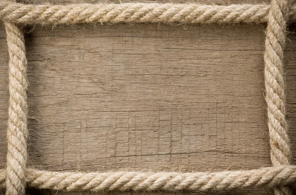 Cuerdas de barco sobre fondo de madera —  Fotos de Stock