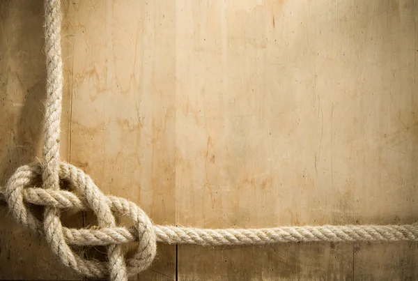Ship ropes and wood background — Stock Photo, Image