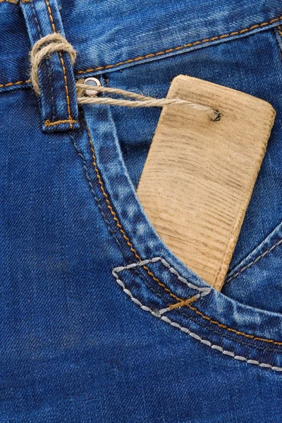 Preço e jeans no bolso — Fotografia de Stock
